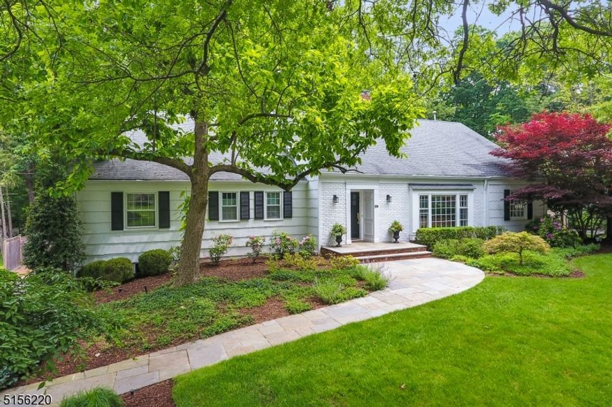 Bright and beautifully appointed Expanded Ranch in the heart of Deerfield. Set on almost half an acre of lushly landscaped grounds with heated in-ground pool and spa and expansive patio with outdoor kitchen. Hardwood floors throughout first and second floors. Chef's Kitchen open to Family Room with Cathedral ceiling, wet bar, wood burning fireplace showcasing a wall of windows and French doors to backyard.  First floor Office with built-ins, Living Room with wood burning fireplace open to Dining Room and three bedrooms; one of which has an en-suite bath.  Second floor boasts a spectacular Office/optional 5th Bedroom and full bath and outstanding Primary Suite with gas fireplace, built-ins and fabulous fitted walk-in closet with additional storage.  Lower Level features temperature controlled wine cellar, Rec Room with Wet Bar and Exercise Area and Mud Room with access to Oversized 2 Car Garage.  This home is a must see!