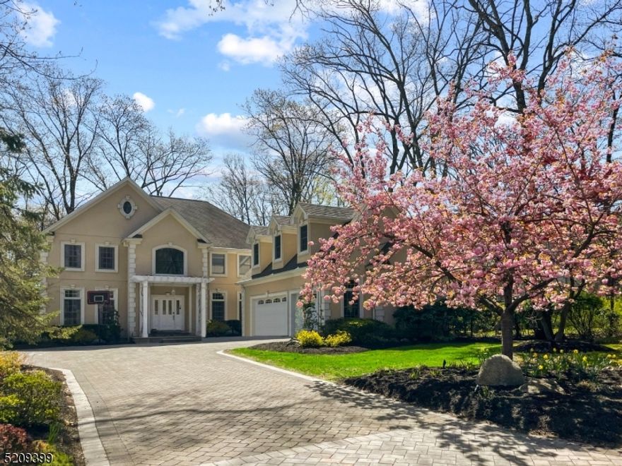 Welcome to this fully renovated Center Hall Colonial near Abma's Farm that is a true gem. The lovingly cared for home boasts custom hickory flooring throughout  the main floor, a stunning kitchen with top of the line stainless appliances, quartz countertops and a custom center island. The sunken LR/Great Rm with soaring ceilings, custom built-in wall entertainment/library cabinetry, coffered ceiling, custom recessed lighting, and chandelier light fixtures, as well as a fireplace with marble surround to complete with sliding glass doors to the back patio. Beautiful Dining Rm, Office, Renovated PR, laundry room, mudroom, 3 car gar. Upstairs, Primary Suite, Junior Suite, 2 additional large BRs, Full bath. Lower Level is fully finished with bonus room, gym, full bath/steam shower. Fully fenced in yard, hot tub, room for pool, fire pit on each level of patio. This house is perfect for entertaining. Just move in and start enjoying the luxurious lifestyle this home offers.