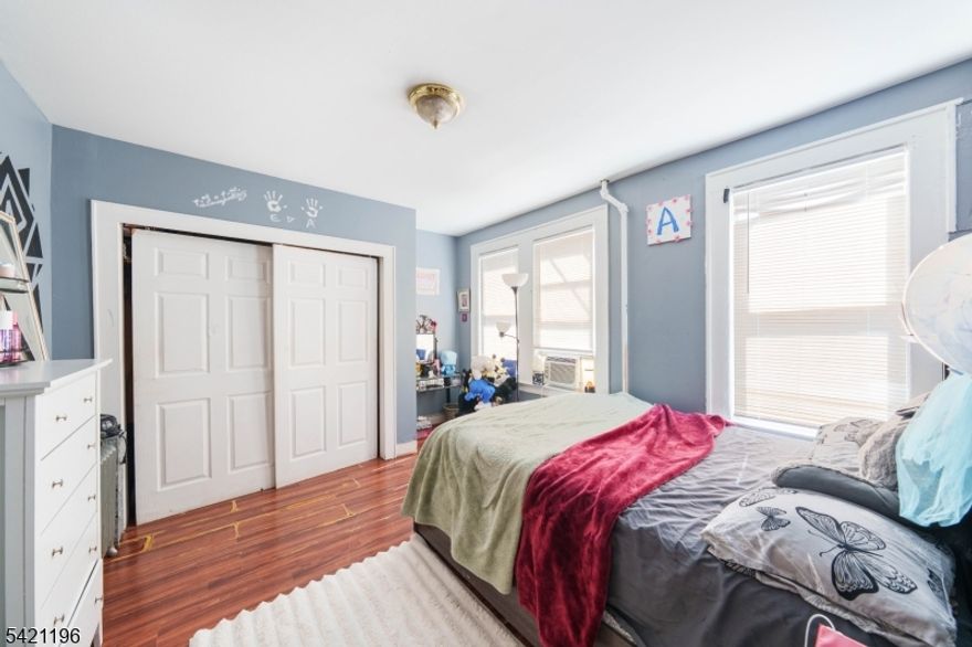 Sold strictly as-is, this home serves as a high-value opportunity to build immediate sweat equity in a prime location. Nestled right on the Maplewood border and just minutes away from local bus routes, the location makes this a high value play for savvy investors and owner occupants alike. The interior layout is expansive and designed for total flexibility. The first-floor unit features a comfortable flow with a living room, a dining room, and an eat-in kitchen with a convenient pass-through window. It includes both a bedroom and a spacious primary bedroom, plus plenty of storage. Head up to the second-floor unit, where the footprint expands to include two bedrooms in addition to a primary bedroom, a full kitchen, and a living area. The added bonus? A third-level finished attic that's currently used as an extra bedroom. This offers the kind of flex space everyone is looking for, whether for a home office, studio, or additional storage. Outside, the property continues to offer value with a fully fenced-in backyard and a stone patio, providing a private outdoor escape that just needs a little TLC to shine once again. Downstairs, the unfinished basement houses the utility room and offers a blank slate for organized storage or further customization. If you've been searching for a property in a location that consistently draws interest, bring your vision to see the endless possibilities this home has to offer.