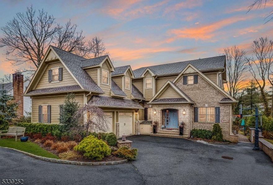 DISCOVER LUXURY LIVING! This stunning 5-bedroom, 5.1-bathroom estate offers a sophisticated blend of luxury and comfort, all set on a serene half acre lot. From the moment you step into the grand hall, you'll be captivated by the expansive open layout, ideal for both casual living and elegant entertaining. The first floor features a private guest suite, perfect for accommodating visitors with comfort and privacy. The gourmet chef's kitchen is a true masterpiece, featuring vaulted beam ceilings, custom cabinetry and high-end stainless steel appliances. It opens seamlessly into a spacious family room with a cozy gas fireplace and French doors leading to a covered back porch perfect for enjoying peaceful outdoor living. The finished basement is designed for relaxation and fun, with a dedicated gym and recreation area, while the lush backyard oasis offers complete privacy. Enjoy a heated gunite saltwater pool with a hot tub, grotto, and waterfall, two built-in BBQs with a refrigerator. Impeccably landscaped, this backyard provides the perfect backdrop for entertaining or unwinding in style. Additional features include a mudroom, two laundry rooms, nanny quarters, a 2-car garage, and ample storage throughout. The home is equipped with a whole-house generator and is located in a highly sought-after Deerfield neighborhood. Turnkey living at its best!