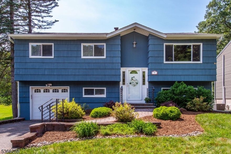 Welcome to this lovely 4 bedroom, 2 1/2 bath Bi-level in the desirable White Meadow Lake Community on a 1/4 acre of peaceful surroundings. This beautiful home has gorgeous, mohagany hard wood flooring throughout, freshly painted, immaculate, nice size bedrooms, central air, ceiling fans in all bedrooms & recessed lighting. The main level features a formal dining/living room with high ceilings, eat in kitchen with plenty of cabinets & sliders that are inviting to an enclosed three season deck with ceiling fan, perfect for entertaining guests and overlooking the massive backyard. It is like a private oasis revolving around an amazing above ground swimming pool and patio.This well-maintained home offers a family room on the lower level with recessed lighting, fourth bedroom or office, half bath and laundry room add extra space perfect for a home office, gym, or recreation room.  The lower level also has  sliders that open up to a secluded patio, garden & nicely landscaped. Enjoy outdoor living in the level backyard, which offers great memories for that yearly football game. The yard includes a handy shed for extra storage.  White Meadow Lake offers unbeatable community amenities, including access to beaches, a clubhouse, tennis courts, pickleball, playgrounds, and year-events. It's a friendly, active neighborhood that feels like home. Located just minutes from major highways, such as Route 80 & 46, shopping centers, dinng, and great schools.  Public water, sewer.& gas in street.