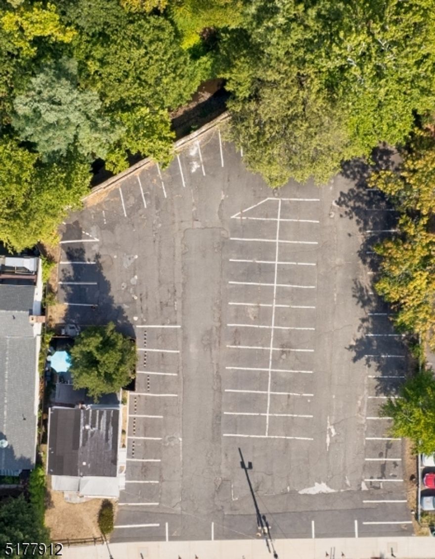 The first time on the market in over 70 years! This prime .838-acre property in the heart of Millburn has so much potential. Currently, the property is used as a successful private 60-car parking lot for the Papermill Playhouse, with a 4-bedroom home. There is so much potential. Do not miss your opportunity to own a large parcel in Millburn.