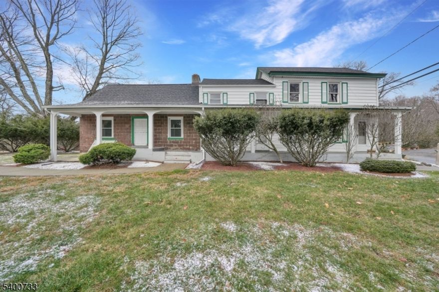 Surrounded by higher priced homes, enjoy the front porch overlooking spacious yard, enclosed back porch, 3 bedrooms, 1 bath, with exclusive driveway and yard. Large living room with exposed beams, and fireplace(decorative-not to be used). Eat in kitchen. Three bedrooms upstairs with an extra nook for office. Part of a 2 family house- this portion is the larger portion with its own driveway and yard. Walkability to shops.