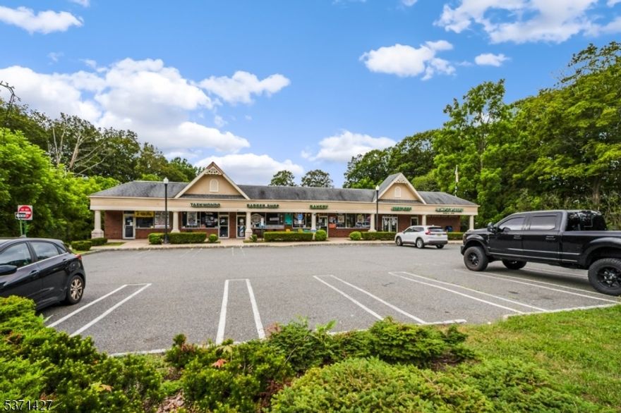 We are pleased to present an exceptional opportunity to acquire a fully stabilized, income-producing retail asset located in one of the most affluent and sought-after areas in the region. This strip mall consists of 8 fully leased units, offering immediate and reliable cash flow backed by a strong tenant base and long-term lease agreements. The center is strategically anchored by the United States Postal Service (USPS), a nationally recognized, credit-rated tenant that generates consistent daily foot traffic and serves as a major driver of visibility and consumer activity for the property. In addition to USPS, the property is home to a diverse mix of well-established local tenants, each contributing to the location's strong identity and long-standing community presence. Positioned along a highly trafficked road, the property benefits from excellent frontage, visibility, and access, as well as a robust consumer demographic with high household incomes and strong retail demand. Ample on-site parking, with 64 dedicated spaces, further enhances customer convenience and tenant appeal. The property sits within an economically vibrant and demographically attractive market. Surrounded by national retailers along Rt 10, upscale residential communities, and well-performing schools, the area continues to show strong population growth and retail performance metrics. The affluent customer base provides a reliable foundation for ongoing tenant success and long-term asset appreciation.