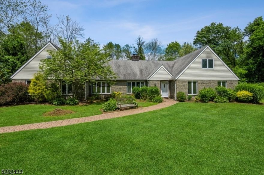 Quiet and highly desirable with a private outdoor oasis! Sprawling Ranch home nestled on more than 6 private acres in Harding. Just 35 from mi from NYC, this bucolic location is within 2 miles of schools and just a10-minute drive to shopping and dining in neighboring towns. A sweeping front lawn and wide stone paver driveway lead to the attached 2-car garage. A back yard oasis offers an exceptional amount of outdoor space w/a rambling patio & lawn ideal for entertaining, gardening & relaxing around the built-in fire pit. The interior features abundant natural light, hardwood & tile flooring & a renovated open concept kitchen. The foyer opens to a large LR w/a massive stone surround fireplace & an open dining area. A tray ceiling enhances the light & bright FR including a warm, exposed brick wall shared w/the kitchen. Throw open the sliding glass doors to the huge screened-in porch & take in the gorgeous views of the lush, green property. The spacious eat-in kitchen is beautifully updated w/granite counters, tile backsplash, sleek white cabinetry, SS appliances, & an island w/a contemporary range hood & seating. Off the kitchen is a laundry rm, half bth & access to the garage. The 1st floor continues w/an oversized primary bd suite including a private bth, a 2nd large bd & a full hall bth. There are 2 more bds on the upper level, along w/another full hall bth. This home has a Basking Ridge mailing address and great potential for reimagining your own custom living space.