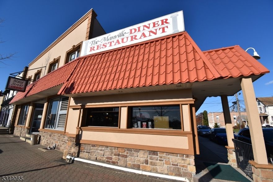 A historic landmark in Manville since 1939. This is a unique property. Included in this corner property is a running restaurant lease for 3 remaining years, a running laundromat with lease for 20 remaining years with annual increases. 9 rental rooms above the laundromat with common bathrooms and long time tenants plus a full basement, separate utilities and a parking lot in the rear of the property. Roof on the rental side has 11 years left on the warranty, roof over the restaurant installed in 2008, 2 AC units installed in 2021 6 tons and 3 ton units plus 2 furnaces installed in 2018.