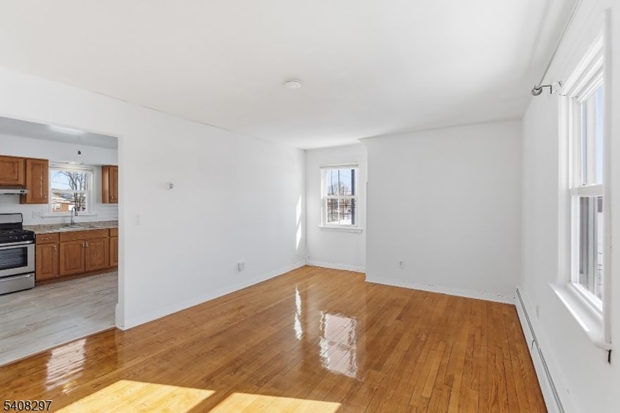 Bright and updated 2-bedroom, 1-bath apartment located directly across from Kennedy Field & Park in Lodi.This 2nd-floor unit offers abundant natural light throughout, newly refinished hardwood floors, and a recently updated interior. The layout is comfortable and functional, with a warm, inviting feel. Kitchen includes refrigerator and gas range. Enjoy open park views right outside your door, along with convenient access to major highways, shopping, and public transportation with an easy commute to NYC. Free street parking is readily available on the block. Please note, this is a pet-free unit and there is no on-site laundry; a laundromat is located nearby for convenience. A well-located, bright, and straightforward place to call home.