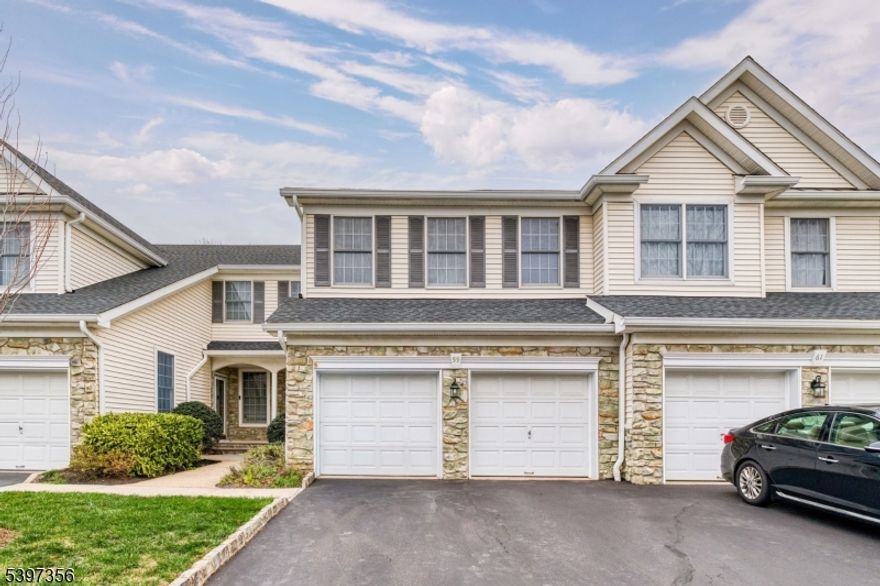 3-bedroom, 2.5-bath townhouse with a 2-car garage and full walkout basement located in Beaver Brook Country Club community. The main level features 9-ft ceilings, fresh neutral paint, crown molding, and gleaming hardwood floors throughout. Enjoy a formal dining room with an elegant chandelier perfect for gatherings, and a bright, spacious eat-in kitchen with 42" cabinets, tile backsplash, pantry, and pendant lighting. Step out to the private deck overlooking wooded views, offering a peaceful setting for relaxation. A cozy family room with a gas fireplace adds warmth and charm. Upstairs, the primary suite includes a large sitting area, ample closets, and a private bath with dual sinks and soaking tub, along with two additional comfortable bedrooms. Newer HVAC (2020) and water heater (2018). Convenient to Routes 22, 31, and 78.