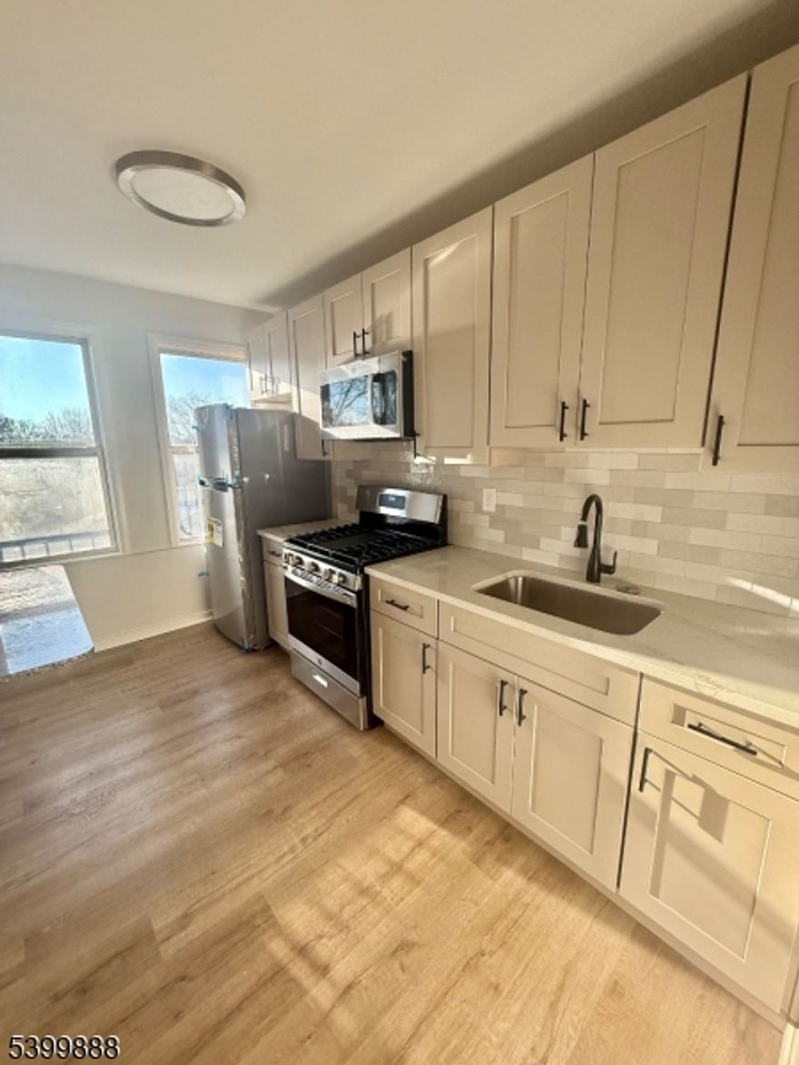 Newly renovated 2 bedroom apartment, brand new floors, kitchen & bathroom in Cranford! Second floor private unit! Amazing location... walking distance to public transportation & downtown Cranford! One parking spot included.