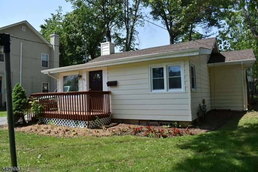 Welcome to this Ranch style home features one floor living. Entry foyer, updated eat in kitchen, granite counter, skylight, S/S appliances, dining room.   2 bedroom, updated bath, Additional room can be used for in home office.  Renovations in 2018 included roof, gutters, gas heater. Living room boast wood burning fire place.  Fenced in yard, deck, 1 car garage.  Close to school, shopping, major transportation and Rt 287, 46, 80. Busing on Rt 46 and minutes to train station nearby.