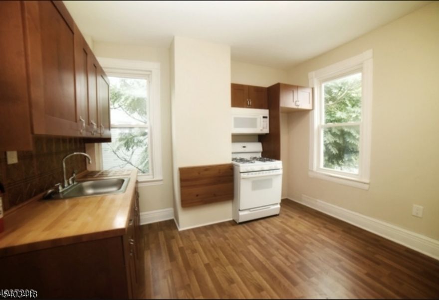 Commuter's Dream! Ideally located near major highways and train stations in a desirable section of Bloomfield. Enjoy close proximity to popular eateries, shopping centers, and public transportation. Just blocks from Bloomfield College.This spacious, renovated apartment offers abundant natural light, and all utilities are separate.,Features include an eat-in kitchen, living room/dining room combo, one oversized bedroom with multiple closets, and a well-sized bathroom. A must-see!Tenant Requirements: 1 month's rent, 1 1/2 month security deposit, NTN application fee per applicant. Credit check, employment verification, eviction check, and background check required. PLEASE NOTE THE APARTMENT IS BEING PAINTED WITH A LIGHT GREY, AND WHITE TRIM.