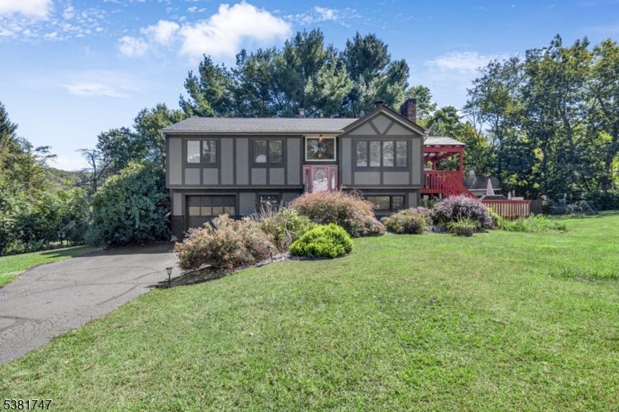 Beautifully maintained bi-level home on 1.28 acres. Home offers 3 bedrooms and 1.5 baths with warmth, character, and modern updates throughout. Main level features cathedral ceiling in living room, a corner stone gas fireplace w/ wood mantle, creating a cozy centerpiece for the living space. The kitchen features KraftMaid cabinets, stainless steel appliances, electric wall oven, granite countertops, stone backsplash, built-in shelving, and plenty of natural light. The formal dining room boasts hardwood floors, a beamed ceiling, floating shelves, and sliding doors that open to multi-tiered decks, perfect for entertaining or enjoying quiet evenings outdoors. All bedrooms showcase hardwood floors and cedar-lined closets. The ground floor offers even more living space with a freestanding wood stove, vinyl flooring, walk-out access to the back patio, and convenient entry to the garage. Additional highlights include central air, hot water baseboard heat, a ROTH oil tank, a roof less than 2 years old, Pella windows with built in blinds on first floor, and a transfer switch for a generator. Outdoors, enjoy an 8' x 16' plunge pool, an 8' x 13' greenhouse, a 12' x 16' shed with a concrete foundation and electric, plus an additional 8' x 7' shed with electric. For added flexibility, the property also offers a natural gas hook-up if the new owner chooses to convert. Furniture is removed now due to a buyer not performing-BOM MULTIPLE OFFERS RECEIVED ALL OFFERS DUE BY 12 PM 12/11/2025