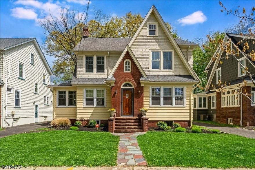 Welcome to 173 Garfield Place, where classic charm meets everyday comfort. This inviting home features beautifully proportioned, large-scale rooms and gleaming hardwood floors throughout, creating a warm and timeless feel from the moment you enter.The spacious living room is anchored by a striking brick wood-burning fireplace, perfect for cozy evenings, and flows seamlessly into a bright sunroom ideal for a home office, playroom, or peaceful retreat. An elegant dining room offers generous space for entertaining, complete with beautiful built-ins for both display and storage. The layout continues effortlessly into the kitchen, with the added convenience of an attached laundry room, powder room, and direct access to a screened-in porch perfect for enjoying warm-weather dining or relaxing evenings.Upstairs, you'll find three generously sized bedrooms, all with hardwood floors and ample closet space, along with a full bath featuring a tiled shower, separate tub, and charming vintage tilework.The unfinished third floor offers high ceilings and expansive space, presenting an exciting opportunity for future expansion. A full unfinished basement provides even more potential to customize to your needs. Recent updates include a new boiler and new heating flue.With its classic details, flexible spaces, and room to grow, this home is ready to be enjoyed and reimagined.