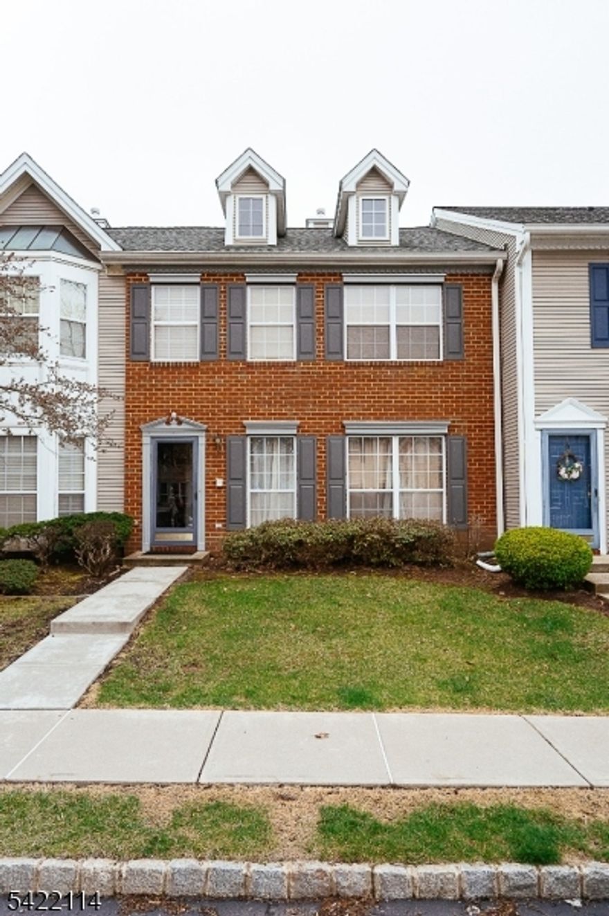 Exquisitely adorned multi-floor townhome, with 3 bedroom with 2.5 full baths, gorgeous engineered wood floors. Kitchen is equipped with stainless steel appliances, center island, overlooking family room, skylights, exterior door to the private patio, fence-in. Brick facade. Master bedroom boasts vaulted ceiling, walk-in closet, ensuite bathroom with double-sink, soaking tub and separate stall shower.  Excellent neighborhood with top notch schools.  Close to all major highways, Rt. 27, Rt. 1, I-95, NYC buses. Just move right-in!