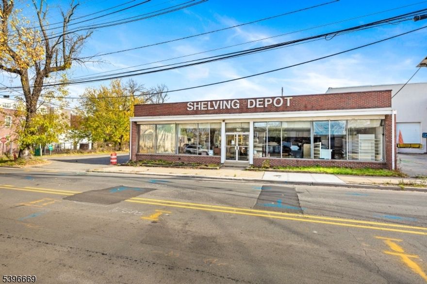 THE LOCATION OF 419 W ELIZABETH AVENUE IS IN THE CENTER OF DEVELOPMENT THAT IS IMPROVING AND BEAUTIFYING LINDEN.  THE PROPERTY IS A 13,000 SQUARE FOOT INDUSTRIAL BUILDING ON ALMOST A HALF-ACRE WITH A STOREFRONT RETAIL SPACE (OR SHOWROOM OR ADDITIONAL OFFICE SPACE) WHICH  COMPRISES 1,800 SQUARE FEET OF THE 13,000 SQUARE FOOT TOTAL.  THE WAREHOUSE/INDUSTRIAL SPACE CONSISTS OF OVER 11,000 SQUARE FEET OF  WAREHOUSE SPACE WITH 2 OVERHEAD DOORS AND 2 LOADING DOCKS WITH OFF-STREET LOADING AND A LARGE PARKING LOT WITH DRIVE-IN POTENTIAL.  THERE ARE LAVATORIES, STORAGE AREAS AND A KITCHENETTE/BREAK AREA FOR STAFF.  THE PROPERTY IS OWNER OCCUPIED BUT ALSO WORKS FOR INVESTORS AND DEVELOPERS.  SURVEY IS ATTACHED.