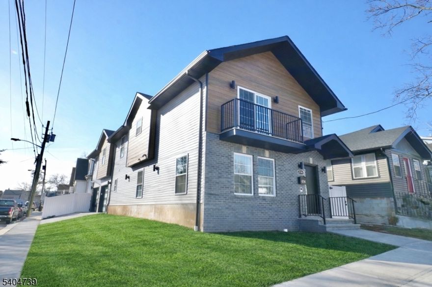 Welcome to this stunning brand-new construction single-family home located on a desirable corner property at 236 Keer Ave in Newark. This thoughtfully designed residence offers 4 spacious bedrooms and 3 full bathrooms, combining modern style with everyday functionality. The ground level features a versatile family room - perfect for relaxing, entertaining, or creating a home office or play space. Upstairs, enjoy gleaming hardwood floors, an open and inviting layout, and abundant natural light throughout. The living room opens to a private balcony, ideal for morning coffee or evening relaxation. The modern kitchen is beautifully finished with sleek cabinetry, contemporary surfaces, and stylish light fixtures, making it perfect for both daily living and hosting guests. The primary bedroom serves as a private retreat, complete with a walk-in closet and a full en-suite bathroom. All bathrooms feature clean, modern finishes. Additional highlights include a dedicated laundry room, a brand-new fenced-in yard offering privacy and outdoor enjoyment, a two-car garage, and a seamless layout designed for comfort and flow. Conveniently located near major highways, public transportation, shopping, and local amenities, this move-in-ready home is a must-see. Schedule your private showing today and experience all this exceptional new construction has to offer.