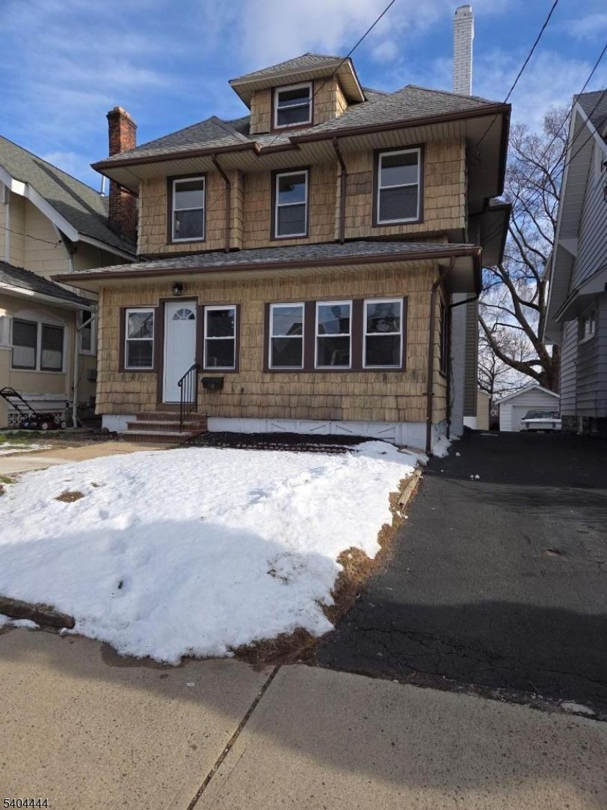 Beautiful large and remodeled colonial with many updates such as brand new windows(except 3), brand new kitchen w/ new appliances and baths, brand new 3/4 in oak hardwood flooring, new steps and so much more!!! First floor offers a beautiful open porch for those beautiful days and nights, Beautiful large entry foyer, open living room and a formal dining room with gorgeous ceiling, additional back room poss office or workout room, beautiful new kitchen w breakfast counter open to dining room/glass backsplash/quartz counters and pantry w slide out drawers and new s/s appliances, new powder room and a rear mud room to yard!! Second floor beautiful bright primary bedroom with window seats,2 additional bedrooms, new bath and walk up stairs to large attic with 2 more potential bedrooms!!! Basement full partially finished & freshly painted with yard access, multi purp rm, laundry & utility room....nice size yard and 1 car detached garage with painted floor and new door/roof and window!! Nothing to do but move in and walking distance to school,shopping,parks and transportation!!!! Will not Last !!!