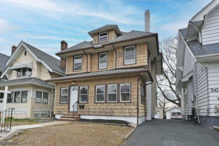 Beautiful large and remodeled colonial with many updates such as brand new windows(except 3), brand new kitchen w/ new appliances and baths, brand new 3/4 in oak hardwood flooring, new steps and so much more!!! First floor offers a beautiful open porch for those beautiful days and nights, Beautiful large entry foyer, open living room and a formal dining room with gorgeous ceiling, additional back room poss office or workout room, beautiful new kitchen w breakfast counter open to dining room/glass backsplash/quartz counters and pantry w slide out drawers and new s/s appliances, new powder room and a rear mud room to yard!! Second floor beautiful bright primary bedroom with window seats,2 additional bedrooms, new bath and walk up stairs to large attic with 2 more potential bedrooms!!! Basement full partially finished & freshly painted with yard access, multi purp rm, laundry & utility room....nice size yard and 1 car detached garage with painted floor and new door/roof and window!! Nothing to do but move in and walking distance to school,shopping,parks and transportation!!!! Will not Last !!!