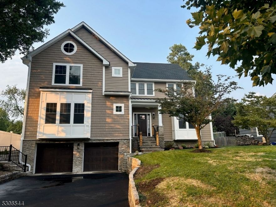 Your search is over!  Your forever home is here.  Newly rebuilt from a ranch to a center hall colonial this home is a masterpiece of sophistication and elegance. Luxurious living at its best in one of Upper Montclair's most coveted neighborhoods.  Step inside and experience the grand two story foyer as your eye moves from room to room.  The open floor plan makes this home flow beautifully and is perfect for entertaining as well as quiet nights at home.  The first floor offers a family room with coffered ceilings, built in gas fireplace and bookshelves, window benches as well as large windows that allows for natural light to fill the room.  The gourmet chefs kitchen offers quartz counter tops, Jenn-Air stainless steel appliances, farmhouse sink, pot filler, wine refrigerator and a gorgeous large center island.  The butler pantry leads into a beautiful dining room and spacious living room.  There is also an office/guest bedroom with an ensuite.  The 2nd floor features a luxury primary suite with a spa like bathroom and a large walk-in closet.  Three additional bedrooms, one with an ensuite, a hall bathroom and a conveniently located laundry room completes the 2nd floor.  Outside is your oasis with a large deck off the kitchen and office as well as a firepit.  This home is conveniently located to NYC direct trains, buses, Watchung Plaza, shops and restaurants, parks and schools.