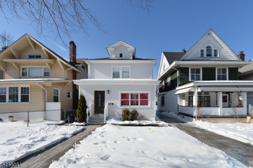 Welcome to this charming Colonial-style home, beautifully renovated and meticulously maintained. This inviting residence offers three bedrooms and two full bathrooms, thoughtfully updated to provide the perfect blend of timeless character and modern comfort.From the moment you step inside, you will appreciate the high ceilings, rich architectural details, and gleaming hardwood floors that add warmth and elegance throughout. The open-concept kitchen is designed to impress, featuring stainless steel appliances, abundant cabinetry, generous counter space, and seamless flow for everyday living and entertaining.With its classic charm and contemporary updates, this home provides an ideal setting for creating lasting memories. Conveniently located and move-in ready, this is truly a special opportunity. Please note: shared driveway.