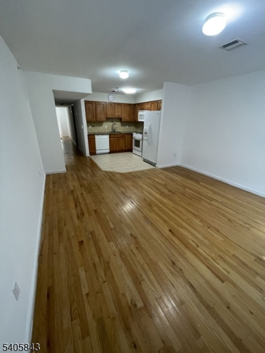 Beautiful; 2 bedroom / 1 bathroom apartment available. Walking distance to Newark Penn Station. Apartment consists of living room, kitchen, full bath, and two bedrooms. Central heat and AC. Harwood floors throughout. Laundry in the unit. Available for immediate occupancy.