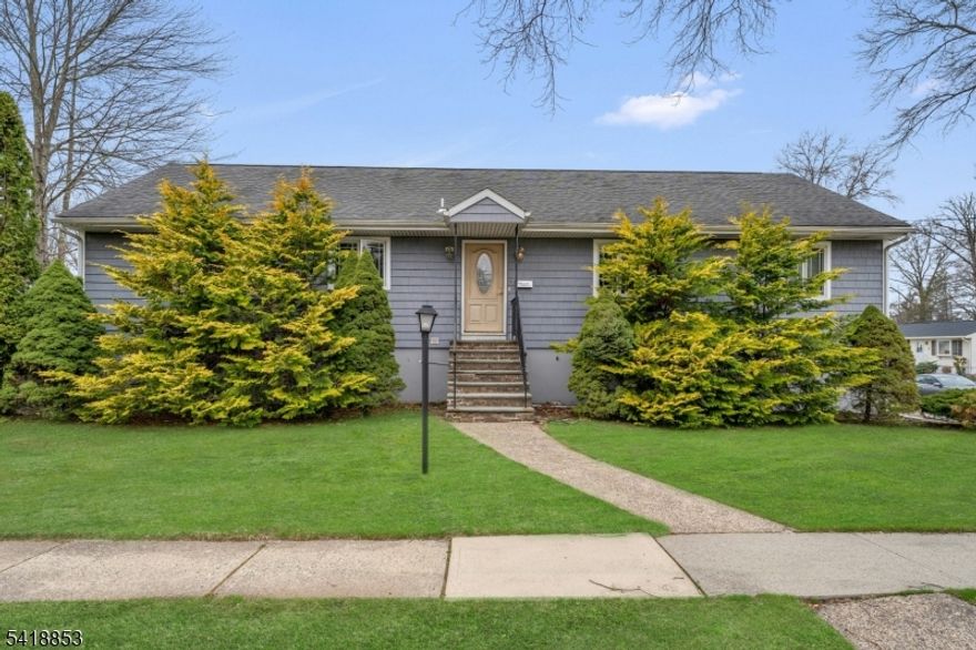 Welcome to your dream home in Wayne on one of the most beautiful, secluded streets minutes away from all the benefits that Wayne brings. This picture-perfect home offers, a new kitchen with beautiful granite counter tops, recess lighting, A separate laundry room with a walk-up attic, A large living room and den with beautiful Anderson sliding doors, Anderson windows throughout the home, 3 bedrooms.1 full and 1 half complete the first floor The downstairs level features an extra kitchen, bedroom, beautiful full bathroom with shower and whirlpool tub,  tv room with a walkout entrance to the backyard -perfect as an in-law suite or entertaining during summer days. This home truly has it all