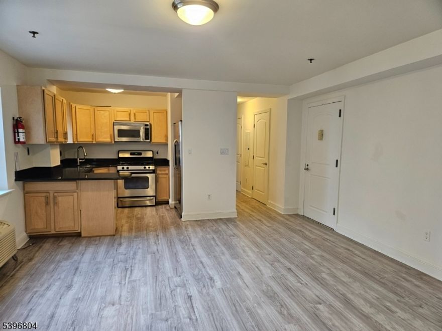 Welcome to condo #602 located in the coveted Empire View luxury condo complex.  BRAND NEW FLOORS THROUGH OUT; LOVELY BRAND NEW BATHROOM VANITY!  Did you know that Condo # 602 is one of the LARGEST  ONE BEDROOM SQUARE FOOTAGE IN THE BUILDING @ 789 SF. Perfect opportunity for an owner occupant or investor. The very spacious bedroom has two large closets. Don't miss out on owning this ONE!  One indoor parking space is included. Other amenities includes newer  stainless steel appliances,  24 hour concierge/security and a fitness center. You will enjoy using the media room which has a full kitchen for you to entertain your guest.  The common area was recently updated and is very welcoming as you enter the lobby. Empire view is conveniently located close to local buses, trains, major highways and is approximately a 15 minute drive from the American Dream Mall.