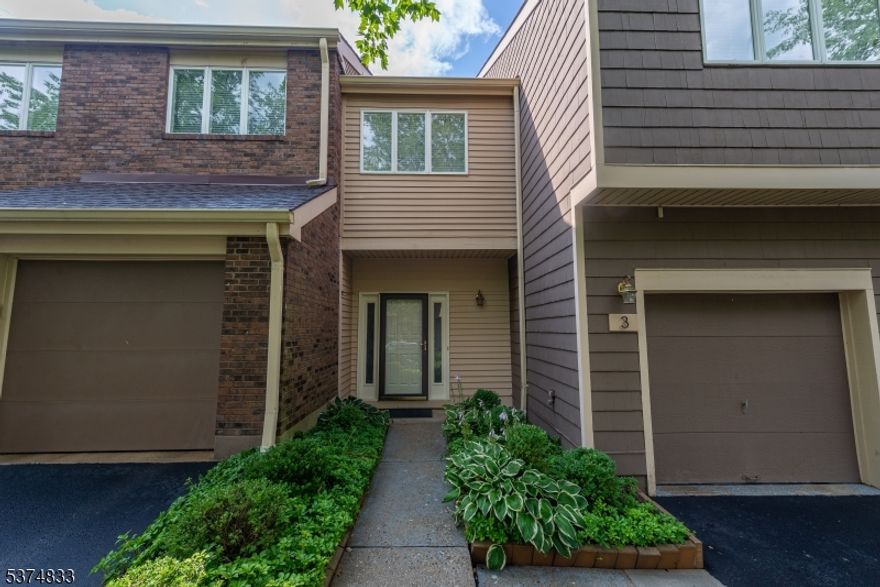 This beautifully updated and immaculately maintained 3 bedroom, 2 1/2 bath townhouse features gleaming hardwood floors, updated kitchen with stainless steel appliances as well as renovated baths. This unit offers an open concept first level with living room and dining room. Second floor features large master suite with large closets and updated en-suite bath as well as two ample additional bedrooms. This levels includes a beautifully renovated hall bath with all glass shower. A laundry room with a washer/dryer can also be found on this level. Complex offers an array of amenities including lighted all weather tennis courts, a newly renovated club house, fitness center and country club like built-in pool.