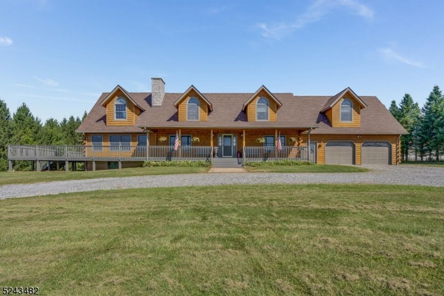 Peaceful country living-- this beautiful custom home nestled on 100-plus acre preserved farm with a tradition of selling Christmas Trees and Nursery Stock. Long entry drive opens to a beautiful custom log home. The gorgeous wrap porch is perfect for relaxing or entertaining. Front door enters to a spacious two-story foyer leading to the formal LR complete w/wood stove. The country kitchen w/ ample dining area boasts walk in pantry. Laundry room is directly off of the kitchen. First-floor bedroom w/ full bath perfect for those needing first floor living. Spectacular family room with skylit vaulted ceilings and warm fireplace.  A built-in wet bar for entertaining w/adjoining game room. Ample room for a large DR table. Upstairs bedrooms off a central hall w/master suite plus 3 BR w/common full bath. Loft area perfect for office or library. Home could easily be upgraded for ADA needs.  Finished walk out basement. The property is actively in grain crop production by a local farmer along with current owners selling landscape and Christmas trees to wholesale and retail buyers. Plenty of agricultural land for various farm crops and/or livestock--flat land naturally suited for horses. Immaculately kept. Roof 2018, Sandblasted, recaulked/stained 2020.  0.7 acre w/8' high metal fence; 10' x 7' run-in animal/pet shed; Barn #1 - 35' x 75' - 1995, 14' ceiling, 4 loading doors; Barn #2 - 36' x 96' 2012, 12' ceiling, 3 loading doors; Hoophouse - 45' x 23'