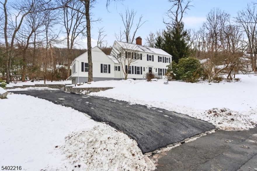 Beautifully renovated 4-bedroom, 2.5-bath Colonial located in the gated community of Panther Valley. This home features gleaming hardwood floors throughout and a sun-filled dining room with a cozy fireplace. The all new kitchen offers quartz countertops, stainless steel appliances, and ample cabinet space, opening to a spacious recreation room perfect for entertaining. A bonus office provides flexibility and can easily serve as a possible 5th bedroom. The primary suite includes a walk-in closet and a full private bath. Enjoy comfort, style, and versatility in this move-in-ready home within a sought-after community. Enjoy summer BBQs and quiet nights out on the large deck. Take advantage of everything Panther Valley has to offer - Multiple pools, tennis courts, walking paths and playgrounds. 5 minutes from Hackettstown Main Street which offers shopping, dinning, breweries, distilleries and close to rt 80, NJ Transit and Centenary University, Fire place sold as is seller has no knowledge of working condition.