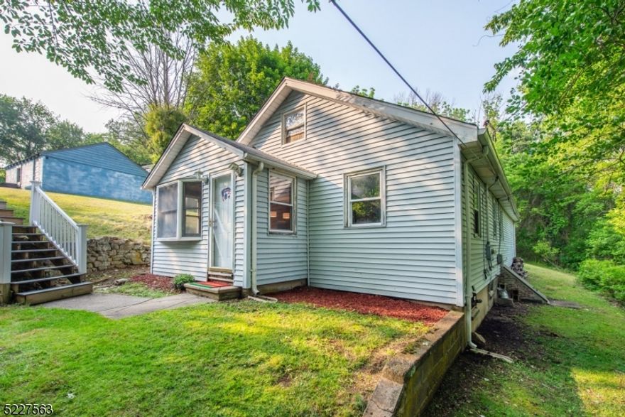 Ranch nestled on private lot! Spacious eat-in-kitchen, living room and family room. Tons of potential to finish! Large back deck, 22x18. Large, detached 2 car garage. Plenty of parking. 3 Generous Sized bedrooms and 2 full baths. Primary suite with full bath. Ideal location for commuters, NYC-Direct Train Stations or Bus. Easy access to major highways. Desirable area close to shopping & restaurants. FINAL AND BEST DEADLINE IS FRIDAY, JULY 7TH AT 2 PM