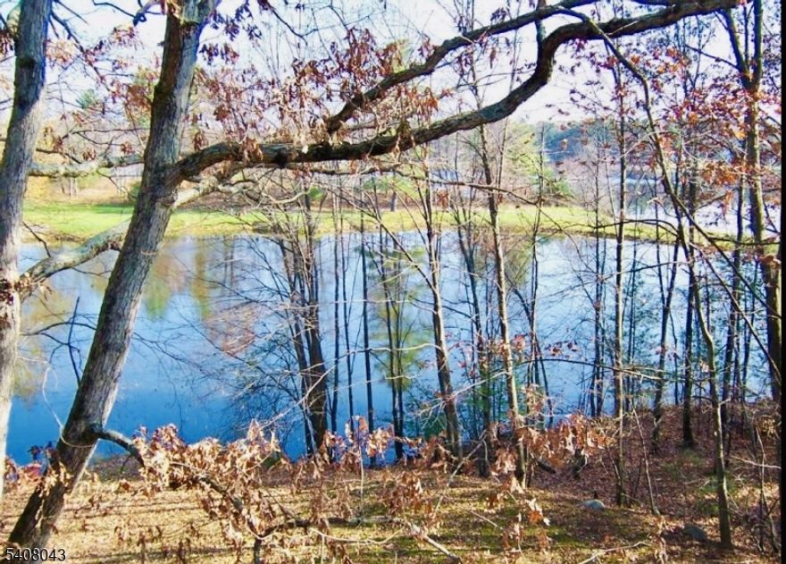 UPDATED WATERFRONT CONDO!  FEATURING: A SPACIOUS OPEN & AIRY FLOOR-PLAN, NEW NEUTRAL CARPETING & FRESHLY PAINTED NEUTRAL INTERIOR, 2 LARGE BEDROOMS & 1 BATH WITH DOUBLE SINKS, NEARLY 1000 SQ FT, LARGE COVERED DECK OVERLOOKING THE WATER, ALL APPLIANCES INCLUDED & PLENTIFUL PARKING ROUND OUT THIS WELL PRICED UNIT! LOW TAXES & LOW HOA!!!