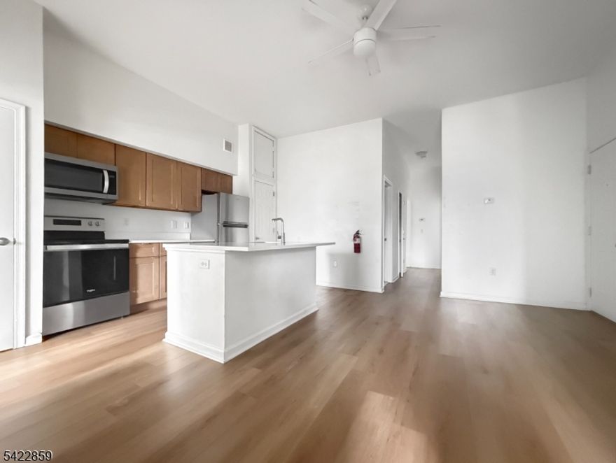 Spacious and inviting FOUR Bedroom apartment that is thoughtfully designed for comfortable everyday living. The heart of the home is a warm and functional kitchen, featuring stainless steel appliances, abundant cabinet space, and a central island with a built-in sink perfect for meal prep and casual dining.Filled with natural light due to well placed windows, creating a bright and airy feel throughout the apartment. Residents will enjoy the convenience of laundry facilities located within the building, as well as off-street parking available in the rear. Great open layout with the living space central to all four bedrooms. Ideally located near downtown Phillipsburg and just across the bridge from downtown Easton, this home provides easy access to a wide variety of shops, restaurants, and local businesses to meet all your needs. Schedule your tour today!