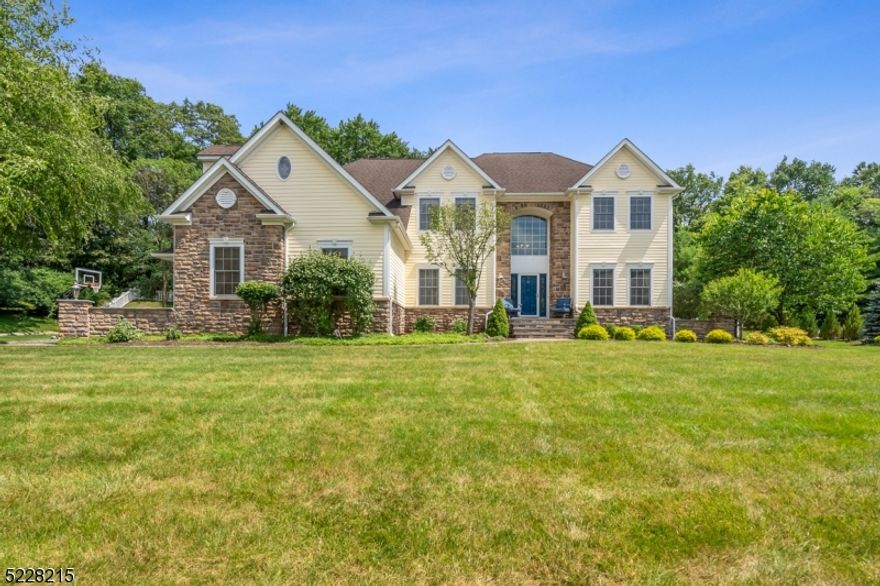 Discover luxury living at its best in this custom colonial home on .9 acre at the end of a cul-de-sac street in desirable Succasunna. This beauty boasts true pride of ownership throughout--a stunning 4 bedroom, 2.5 bath with an impressive 2 story foyer & spacious open floor plan perfect for entertaining. The kitchen will delight with new butler's pantry & is perfect for culinary enthusiasts. It adjoins the bright family & dining room making it ideal for gatherings.  These rooms are comfortable yet luxurious, featuring wood floors and are adorned with moldings. The 1st floor is also highlighted by a family room with vaulted ceilings, gas fireplace & home office. Ascend to the upper level to find 4 generously sized bedrooms. The primary suite is a true retreat: features a luxury bathroom, 3 walk-in closets, plus a fourth closet & a separate sitting room that adds versatility--either an office, dressing room or a quiet reading nook.  2nd floor laundry is certainly an added convenience & provides easy accessibility to walk up to a full attic. A partially finished basement offers additional versatile space for recreation. Vacation at home with the Sundance hot tub & dreamy gunite in-ground pool. This showpiece is surrounded by professionally designed landscaping. Pool heater was replaced in 2020; pool cover & equipment are included. Public utilities here! This home is immaculate, well cared for & is ready for its new owners. Minutes to all major roadways- Routes 10, 46, 80 & 206.