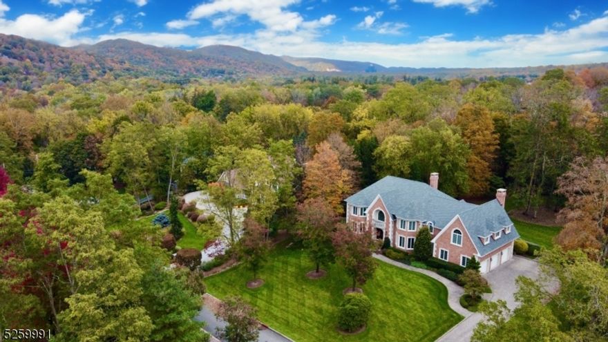 Rio Vista Estates, prime cul-de-sac location with mountain views.  Custom all brick home with approx. 7600 sq ft of luxury living. Grand entrance foyer connecting to a formal living & dining room leads to a  2-story sun-filled great rm with wall of windows, fireplace and built-in wet bar. Elegant cherry office/library. Gourmet kitchen with an oversized center island, breakfast bar & large eating area with vaulted ceiling & skylights, flows to the family room with fireplace. Off kitchen is a bluestone patio & a private level backyard.  2 powder rooms & laundry complete the first floor.  2nd level has a lavish primary suite with a trayed ceiling, fabulous new spa bath, a second ensuite bedroom with new bath, 3 additional bedrooms & another new stunning full bath. Walkout finished lower level with 6th Bedroom for guests with full bath, media, game & gym areas. Updates: roof, furnace & hot water heater ('18), 3 upstairs bathroom ('21) & freshly painted rooms throughout.   Rio Vista amenities include: clubhouse, gym, outdoor pool, tennis, pickleball, basketball, playground