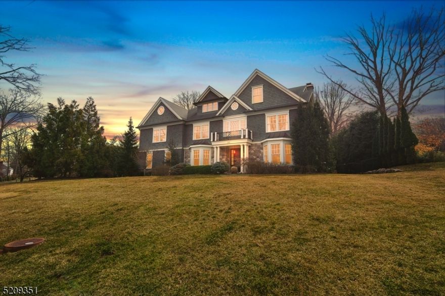 Built by Award Winning Highgate Hill Builders in 2013, this 7 bedroom 6 1/2 bath Center Hall Colonial combines an ideal open layout with a large open gourmet eat-in kitchen totally open to the family room with a wood-burning fireplace & French doors to the heated, covered patio & stunning property, a 1st floor in-law suite, en suite baths in each bedroom, and beautifully appointed living spaces. Completely transformed by a recent renovation & decorator, this residence is truly impressive. State of the art lighting & technologies enhance the setting. You'll love the incredibly private exterior which features a saltwater pool, spa & waterfall, summer kitchen, and heated covered patio with gas fireplace. Your own private oasis! In the breathtaking interior, the grand 2-story entrance hall sets the tone & opens to the dining room with a butlers pantry with 2 Subzero wine refrigerators and to the living room with built-in bar that you would see in a luxury hotel. The luxurious Primary Suite features a private sitting room, dressing room, 2 huge walk-in closets, & a spa-like bath with jetted tub & resort style shower. Conveniently located 2nd level laundry and 4 more bedrooms complete the 2nd level. 3rd level recreation room is spacious & carpeted, perfect for playdates and movie nights. Lower Level with recreation room, exercise room and Nanny's Suite. This stunning home & property is ideally located on a prestigious street in the highly rated Hartshorn Elementary School District.