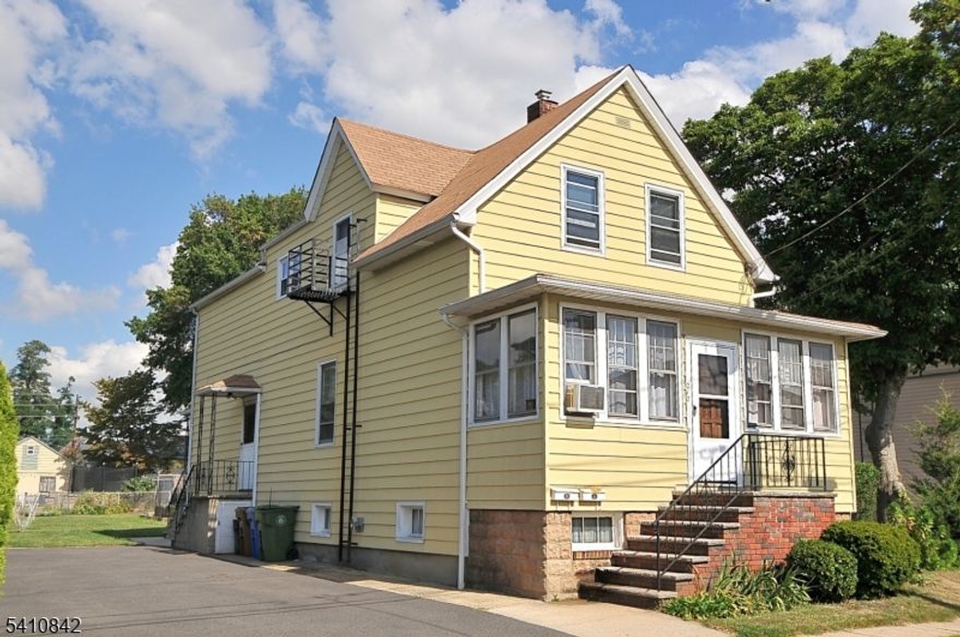 Spacious Multi-Family home located on quiet no through traffic street with 2 large apartments. First floor unit features LR, DR, Kitchen, 3 bedrooms and full bath. The 2nd floor apartment with 2 bedrooms, large living room, kitchen, dinette area and full bath. First floor unit freshly painted with brand new carpeting, and brand new gas furnace. Extra large backyard (45x150) perfect for entertaining! On-site parking for 4 cars. Full basement with ample storage, half bath and outside entrance. Commuters will appreciate close proximity to NJ Transit Station (only 2 blocks away) with direct line to NYC. Easy access to major highways and Newark Airport.