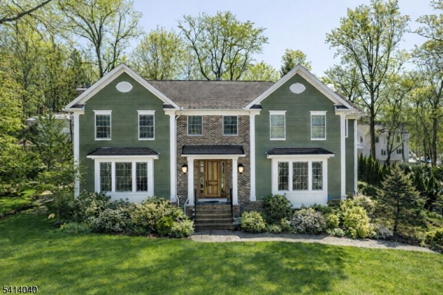 This exceptional newer construction home showcases fine craftsmanship and thoughtfully designed living spaces throughout. Richly toned hardwood floors, detailed moldings, and designer touches enhance the bright, spacious rooms, while refined architectural elements elevate every level. A dramatic two-story entry makes a striking impression with an elegant staircase, grand front door, and dual coat closets. The sun-filled living and dining rooms are ideal for entertaining. The chef's kitchen is a true centerpiece, offering high-end appliances, granite countertops, abundant cabinetry, and an expansive center island. A sunny breakfast area with wet bar and sliders to the level backyard and paver patio make indoor-outdoor living a breeze. Open to the kitchen, the inviting family room is anchored by a gas fireplace framed by oversized windows. A pantry and full bath complete the main level. Upstairs, the private primary suite features tray ceilings, two walk-in closets, and a luxurious en-suite bath with jetted tub, separate shower, and linen storage. Three additional spacious bedrooms share a hall bath with dual vanity and private toilet area. A large laundry room with sink and cabinetry adds convenience. The finished lower level offers a mudroom with built-ins and garage access, a large recreation room, full bath, and generous storage. This is a beautifully crafted home blending luxury, comfort, and function