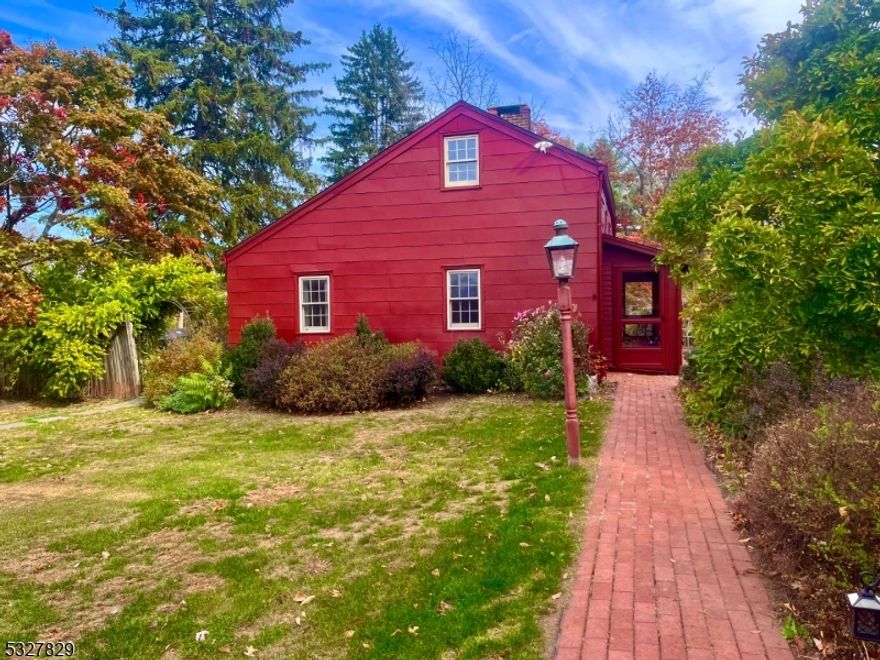CHARMING COUNTRY COTTAGE NESTLED ON ALMOST 3/4 0F AN ACRE. THIS AMAZING OPPORTUNITY FEATURES A COZY FARMHOUSE WITH A MODERN CUSTOM KITCHEN, LARGE CENTER ISLAND, GRANITE TOPS AND S/S APPLIANCES. THIS HOME ALSO FEATURES A LARGE LIVING ROOM WITH TRADITIONAL "FARMHOUSE STYLE" WIDE PLANK FLOORING, COZY WOOD BURNING FIREPLACE AND BEAMED CEILING. THERE IS A 1ST FLOOR BEDROOM WITH A WALK-IN CLOSET OR POSSIBLE OFFICE AREA. UPSTAIRS YOU WILL FIND 2 BEDROOMS WITH ORIGINAL HARDWOOD FLOORING. CURRENTLY THE HOME IS SERVICED BY OIL HEAT AND PROPANE FOR THE GAS COOK TOP. NATURAL GAS IS AVAILABLE AND IS IN THE STREET. OUTDOORS YOU WILL FIND AN OVERSIZED 2 STORY 2 CAR GARAGE WITH MANY POSSIBILITIES AND A ADDITIONAL 1 CAR DETACHED GARAGE FOR ADDED STORAGE FOR CARS OR EQUIPMENT. LARGE PRIVATE BACKYARD WITH A WONDERFUL BRICK PAVER PATIO AREA AND DECK. THIS PROPERTY IS TRULY ONE-OF-A-KIND AND FULL OF THE CHARM OF YESTERYEAR. CLOSE TO MAJOR ROUTES AND SHOPPING. HURRY, THIS ONE WILL NOT LAST!!