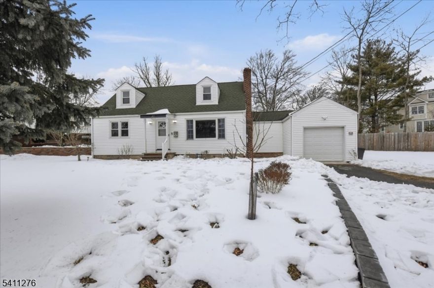 Situated on a beautifully landscaped property, this home enjoys a prime spot in the desirable Wyoming neighborhood. Features include 4 bedrooms, 2.1 bathrooms, is thoughtfully designed, and provides the right flow for seamless indoor /outdoor entertainment. Spacious living room, dining room with a fireplace, brand new gourmet kitchen with SS appliances. Walk through the glass door to the adjacent patio overlooking the private backyard, that provides space for al fresco dining. This incredible home is located just minutes from Millburn's top-rated schools, renowned downtown, short walk to NJT train station.