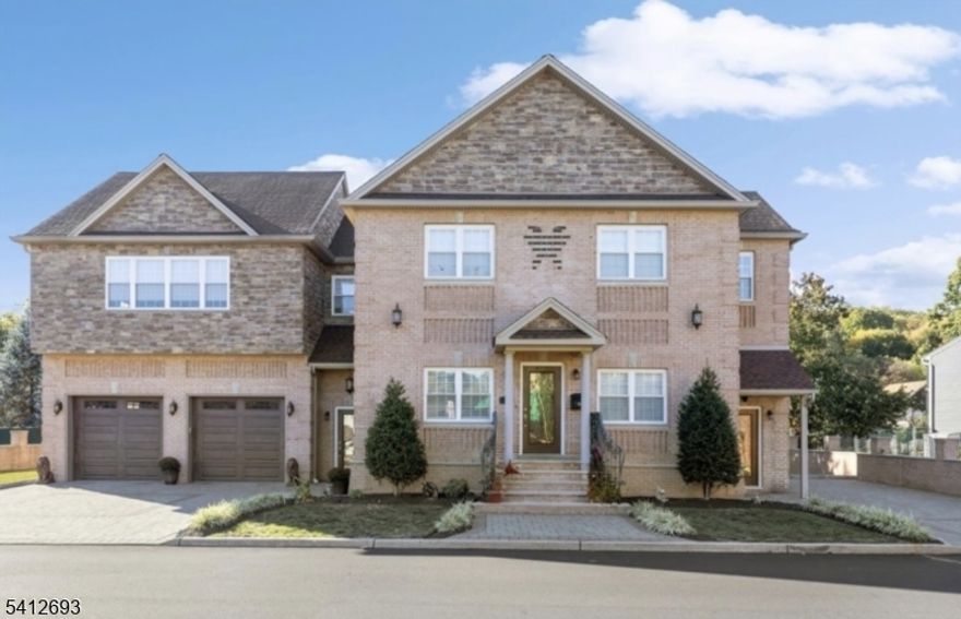 Welcome to 7 Bailey Ave #1   a beautifully built three-bedroom, three-bath home offering modern comfort and thoughtful design throughout. Features include wide-plank hardwood floors, multi-zone heating and cooling, a heated garage, crown molding, wrought-iron railings, and designer tile work. The home offers three bedrooms, including two en-suites. The primary suite features dual custom closets (one walk-in) and a spa-like bath with a jetted tub, rainfall and handheld shower heads, and elegant tile accents. An open-concept layout connects the spacious living and dining areas to a stylish kitchen with two-tone cabinetry, granite countertops, Samsung stainless steel appliances, a built-in hood, and a center island. A first-floor bedroom and full bath add flexibility. Additional storage is available in the unfinished basement and floored attic. Enjoy Bloomingdale's small-town charm with nearby parks, lakes, shopping, dining, and easy highway access.