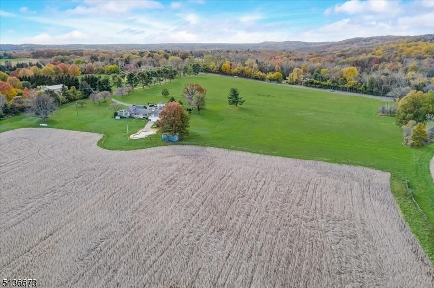 This 130+ acre property has the DEVELOPMENT RIGHTS INTACT and is in the VRC zone in Hopewell Twp. The land being sold consists of two parcels:  Block 62 Lot 3 which includes 95.4 acres, two houses and several outbuildings (offered separately for $2,750,000) and Block 62 Lot 2.02 with 35.17 acres. Both parcels are currently farm qualified, reducing the property taxes. The future Owner of this property could explore developing the land further or selling the development rights of one or both parcels. According to the 2020 Mercer County Master Plan these parcels are targeted for preservation since many of the surrounding properties are preserved and protected by conservation easements. Other possible options for the property one can explore include turning it into an equestrian destination, a vineyard, a possible solar farm or building a house of worship (buyers to independently verify all intended uses of the property with the township). The 3 bedroom, 3 full bath main house is one level and built in the late 1960s/early 1970s. It has an eat in kitchen, dining room, living room, family room, vaulted ceilings, beautiful views of the surrounding land, generator, 3 car garage and inground pool. The farmhouse has 3 bedrooms, 2 full bathrooms and outbuildings including a three bay garage and six stall barn. The property is near major routes including 295 & Rt. 31. Buyer responsible for the rollback taxes if the farm qualification is not maintained.