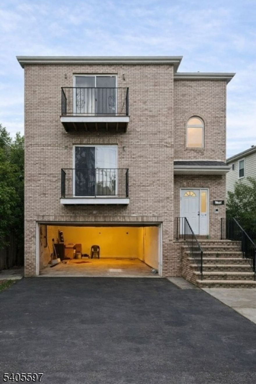Massive Three-Family Home in the Heart of Newark.This spacious three-family home offers plenty of natural light and modern amenities. The first floor features 2 beds, 1 bath, while the second and third floors each offer 3 beds, 2 baths with ensuite bathrooms. The first and third floors have been recently renovated. Each unit boasts a large kitchen, open living/dining areas, walk-in closets, and central heating/air. Additional features include a built-in two-car garage and prime location near transportation, schools, shopping, places of worship, and direct access to buses and trains to NYC.