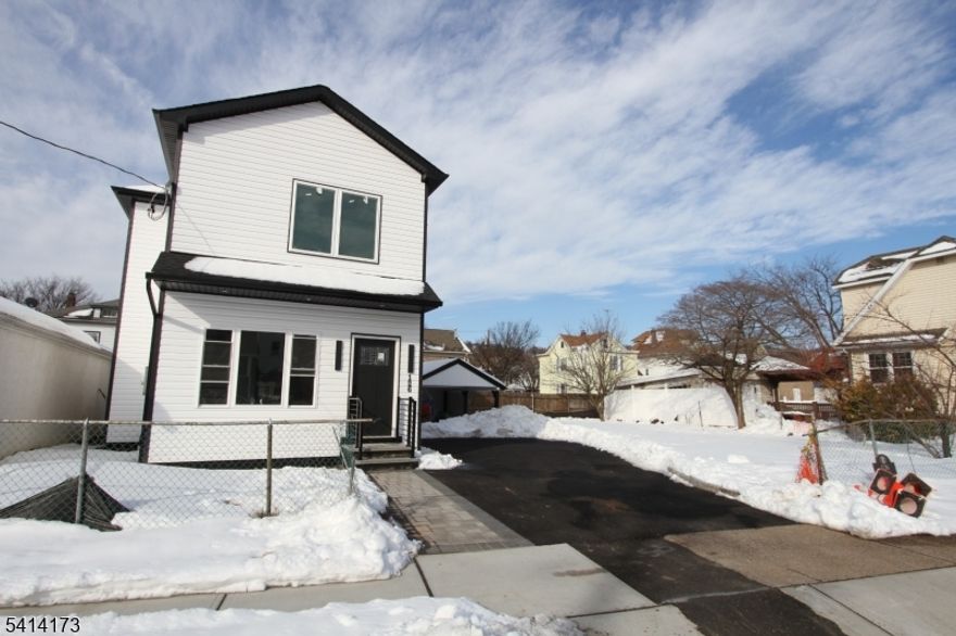 Come see this totally new home inclucing the foundation on a spacious level lot. House was taken down and completly built to todays standards! The open floor plan and bright modern finishes can suit many lifestyles. The carport can even double as a covered patio!