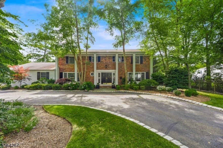 WHEN A LOVELY SETTING AND PRIME LOCATION TOP YOUR LIST, LOOK NO FURTHER THAN THIS CLASSIC "COVENTRY" CENTER-HALL COLONIAL. RESTING ON LUSH GROUNDS WITH GORGEOUS LANDSCAPING, CURB APPEAL IS ONLY THE BEGINNING. INSIDE YOU ARE GREETED BY A DOUBLE DOOR ENTRY TO THE FOYER, LEADING TO THE ELEGANT SPACIOUS MAIN LIVING AREA. BRIGHT SUNDRENCHED SPACES & NEUTRAL DECOR WELCOME THE OPPORTUNITY TO ENTERTAIN.  YOU'LL FIND GLEAMING WOOD FLOORS WITH CLASSIC BASE & CROWN MOLDINGS THROUGHOUT THE MAIN LIVING SPACE. A WOOD-BURNING FIREPLACE ANCHORS THE GREAT ROOM, IN ADDITION TO A GAS FIREPLACE IN THE FORMAL LIVING ROOM. THE INCREDIBLE KITCHEN LIES BEYOND THE FORMAL DINING ROOM AND GREAT ROOM WITH CUSTOM CABINETRY, GRANITE COUNTERS, STAINLESS APPLIANCES, A GENEROUS 2 TIER CENTER ISLAND WITH SEPERATE BREAKFAST AREA, SLIDERS TO THE PATIO, INGROUND HEATED POOL PLUS A GENEROUS BACKYARD. A LAUNDRY ROOM, POWDER ROOM, HOME OFFICE WITH BUILT-INS, 1 BEDROOM AND A FULL BATH COMPLETE THE MAIN LEVEL.THE UPPER LEVEL FEATURES FOUR BEDROOMS, INCLUDING THE PRIMARY BEDROOM EN SUITE.  THE PRIMARY BEDROOM BOASTS A PRIVATE BALCONY OVERLOOKING THE POOL AND REAR GROUNDS. THE LOWER LEVEL FEATURES A WINE CELLAR, TASTING ROOM, RECREATION ROOM, 2 GAME AREAS AND STORAGE. THE OUTDOOR SPACE FEATURES A 20 X 40 INGROUNG GUNITE POOL, COVERSTAR AUTOMATIC SAFETY POOL COVER, PATIO AND EXPANSIVE LEVEL YARD, OFFERING THE IDEAL VENUE FOR DINING , ENTERTAINING , ACTIVE PLAY AND GARDENING.  THIS HOME IS NOT TO BE MISSED!!!!!