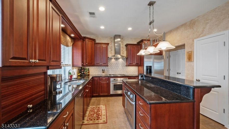 Extraordinary upgrades mark this CLAREMONT Model. A designer granite floor punctuates the entry. Gleaming mahogany floors flow through to the Great Room. Stunning chandeliers shimmer above you.  The original owners tore out the builder's kitchen & created a showcase Cook's Kitchen complete w/European solid cabinetry, tumbled marble backsplash, SS appliances including Fisher Paykel & Bosch, 2 wall ovens (1 in the center island w/raised breakfast bar) 5 burner gas cooktop topped by a range hood, black granite CTPs & a custom tile floor.  It's gorgeous! The powder room is totally re-done. The banister to the second level is wood w/wrought iron spindles. The 2nd level was re-designed to enlarge the bedroom & create a Leisure room w/huge storage closet! And there's more!  This one of a kind home is nestled in Somerset Run, an ACTIVE & INCLUSIVE  Over 55 Community w/25,000 S.F. Clubhouse w/ indoor & outdoor pools, gym, book, card, game, art & ball rooms.  Enjoy our clubs, events & activities. Minutes from major highways, excellent medical care, malls, parks, golf, great restaurants, theater, Rutgers, Princeton & trains/buses to NYC.  Join us!