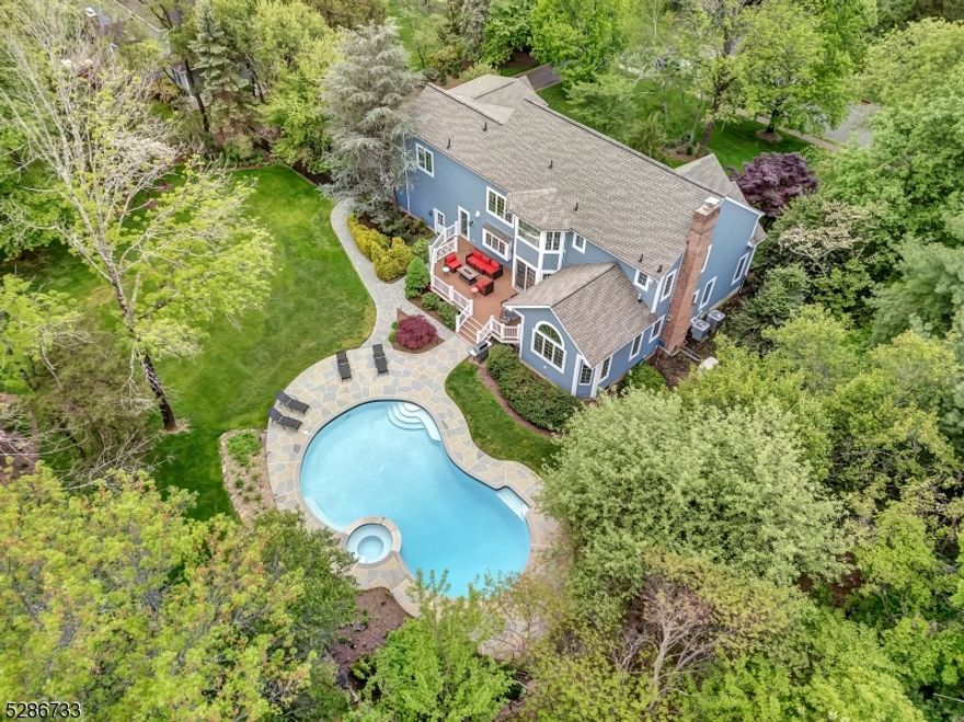 Welcome to the home that meets all of your needs! A blend of indoor comfort & outdoor serenity, nestled within the desired Highland Farms development of Basking Ridge. This tastefully updated Bocina-built center hall colonial, sitting on 0.91 acres, boasting 5 BRs & 5 full baths, w/ a resort-like backyard, exudes modern practicality & comfort. Its open floor plan greets you w/ a well lit 2 story foyer. The adjacent LR w/ a high ceiling, enjoins a spacious FR complete w/ a gas fireplace. A reconfigured Kitchen (2018) is adorned w/ SS appliances, Quartz countertops, a center island offering seamless style & functionality. Nearby, the formal DR is perfect for cordial holiday gatherings w/ loved ones. The FR flows into the brightly lit Sunroom that exits out to the back deck. The 2nd floor is featured by a tranquil primary BR w/ a high ceiling plus an exquisitely updated bathroom (2020) with steam shower & WIC. There are 4 other BRs & 2 updated baths including one BR w/ an ensuite as well as a recently installed laundry room. Come home to an oasis in your backyard after a hard day's work - a newly resurfaced curved pool pared with hardscape, a large Trex deck will offer you years of relaxation & enjoyment. To complete this abode is a full finished basement w/ a full bath & a whole house generator ensures peace of mind in case power is lost. Throughout the home, meticulous attention to detail & quality craftsmanship abounds, marrying modern updates w/ classic charm. A Must See!