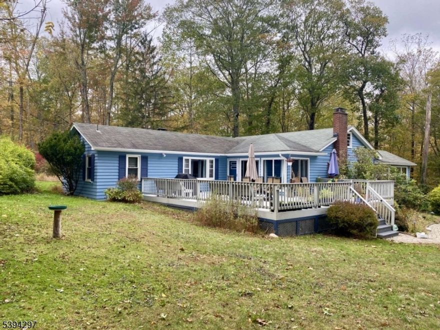Welcome Home! This beautiful 3 BR 2 Bath 1940 sq.ft ranch w/ a 2 car detached garage on 4.46 acres in delightful Branchville, abuts Culver's Creek, a state stocked trout stream. All amenities are 5-20 minutes away. Masterfully updated, every room boasts endlessly with pragmatic updates. The interior and exterior recently repainted. With 3 fireplaces, 2 w/ wood burning stoves and a full fireplace in the DR. Security is a snap w/ an 8 camera, 4K CCTV 24/7 security system w/ a 32  live monitor. New 200 amp main breaker panel w/ whole house surge protector which covers up to $75k in damages, as well as the manual transfer switch for the included 7500 watt electric start generator. In 10 mins. life is back to normal. Wonderful flow from one end to the other, built-ins in 3 rooms, stainless appl. in kitchen, beautiful views everywhere of the estate like property! 2 chimneys repointed! Too many updates to list! Septic is recommended to be replaced within the next 5 years. The whole house boasts new LED recessed lighting w/ dimmers, all new switches and outlets, some w/ USB charging ports, and new stained glass lighting fixtures! Dining room has hardwood floors with inlays and 6' windows overlooking deck and yard. Living room has a beautiful stone fireplace, built-ins and large picture window. Both bathrooms updated. Bedrooms have great views and generous storage. Den has gorgeous views and stone fireplace w/ new carpet. Huge deck w/lighting. Sold As-Is.