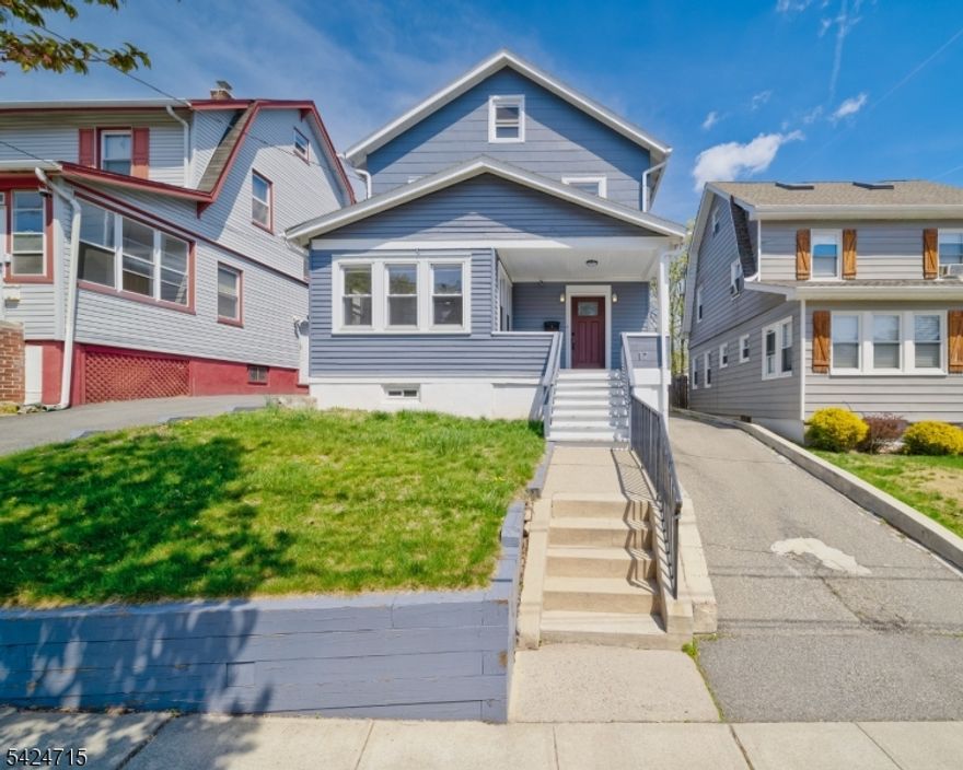 An exceptional opportunity in the heart of downtown West Orange, this is the home you've been waiting for! Live the perfect blend of comfort and convenience in this spacious updated residence, just minutes away from major transportation such as the Orange Commuter Rail Station, shopping center, restaurants, places of worship and the Eagle Rock Reservation.  Inside, you will find an open-concept layout with recessed and ideal chic soft lighting. The main level showcases a beautiful kitchen with all wood cabinetry, large island, stainless steel appliances, flowing seamlessly to the dining area, living room and backyard through a sliding door that leads you to a backyard platform; creating a wonderful space for entertaining and relaxing. Upstairs, retreat to the bedrooms, with a fully renovated main bath and hallway access to a fully renovated attic space that can serve as a home office, playroom, family room or simply extra space.  Basement is fully cleaned and painted, and can be used as a home gym, storage space and more. Oversized two-car garage plus driveway for 3 to 4 cars. Home is in great condition.  Please note that the home is being sold as is.