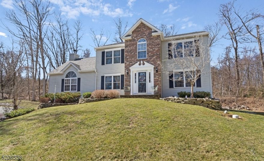 This 4 Bedroom 3.5 Bathroom Great Meadows Colonial checks off all the boxes! Enter through brightly lit foyer into Kitchen open layout flows into spacious family room with wood burning fireplace and cathedral ceiling. Newer slider door off the family room leads to deck and yard with swing set (to stay- stained in 2022). Keep French doors open or closed in the formal dining room as it's a great space for entertaining! Powder room and laundry on the main floor.  Finishing out the first floor with an additional living room with new carpet (2020) has potential for home office.  The upper level features newer flooring in bedrooms, spacious primary ensuite with full bathroom and walk in closet. Three additional bedrooms and a full bath complete the 2nd floor. Fully finished basement with storage closets adds to your entertainment and living space. Pull down stairs for attic storage. Most recent upgrades: new flooring in bedroooms / family room, furnace, front windows ( 2019), roof (2020), windows and slider door (2022),   new insulated garage doors (2023). All appliances included and in addition there's a generator hook up. Convenient to Hackettstown shopping and dining, Centenary University, 1/2 hour to Pennsylvania ski resorts. 10 Minutes to Route 80! A Must See!